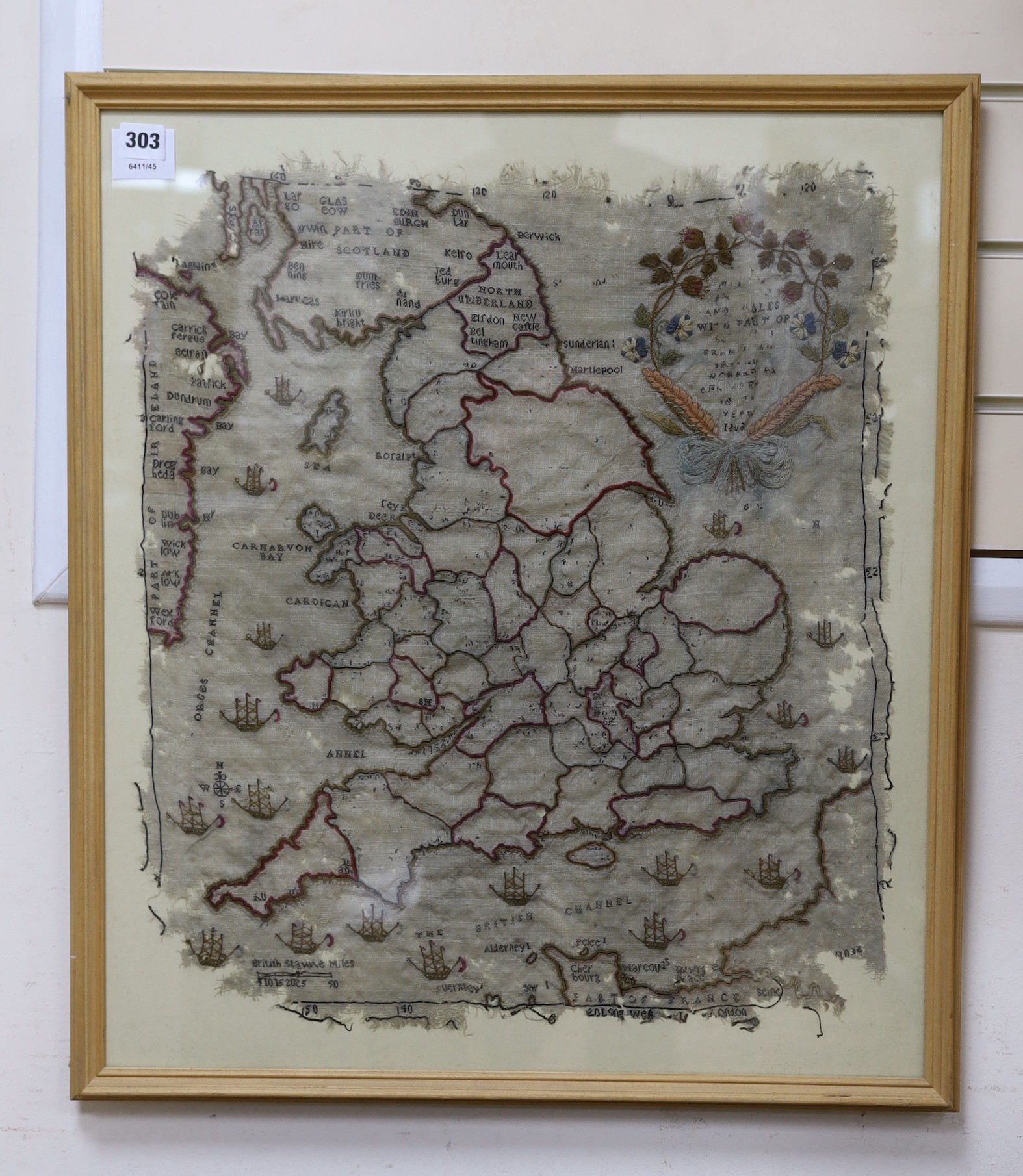 A framed early 19th century map sampler of England and parts of Scotland and Wales. 55x49cm excl frame